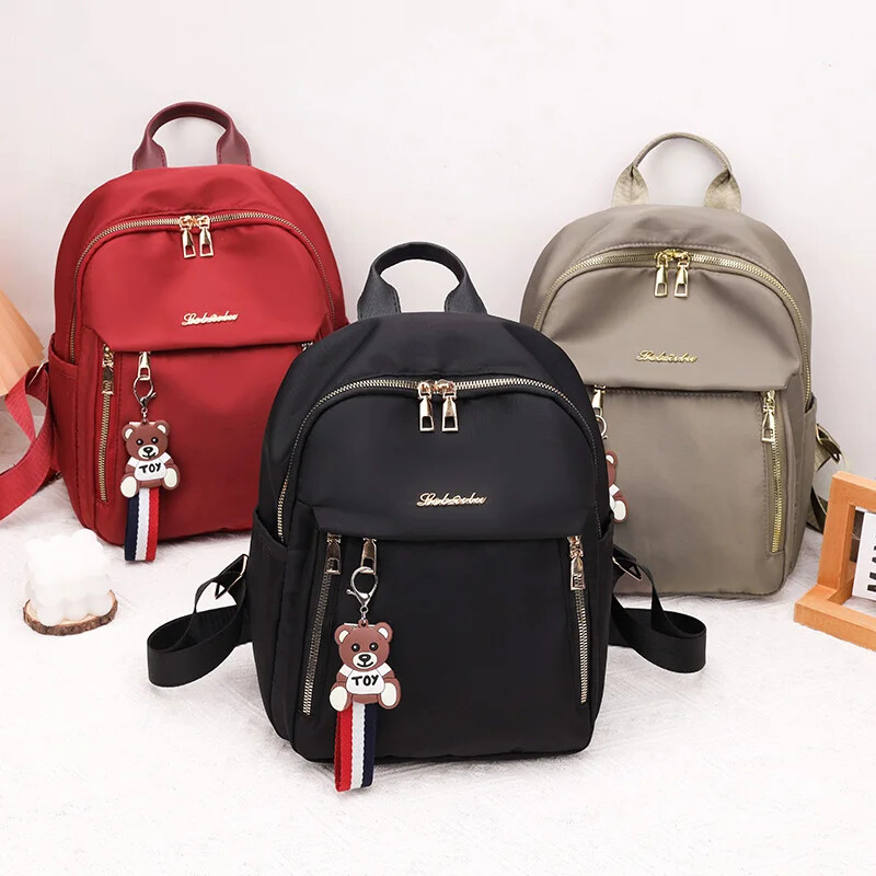 Čvrsti patentni zatvarač velikog kapaciteta Vodootporni najlonski modni ruksaci 2024. Vruća rasprodaja Svestrana ženska torba Mochila Mujer Mochila