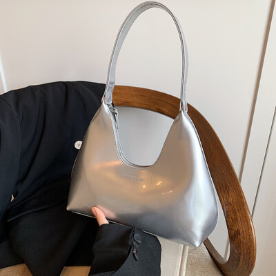 Ovo je lakirana kožna torba za rame, moderan i visokokvalitetan trend, prikladna za kupnju i izlaske