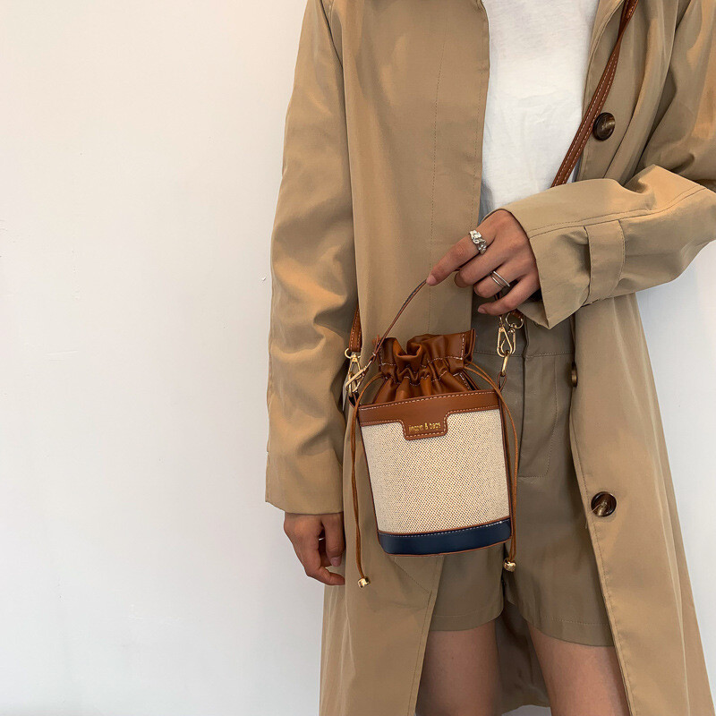 Női válltáskák hengeres PU bőr vödör Crossbody táska alkalmi húzózsinóros kézitáskák pénztárca utazási vásárláshoz