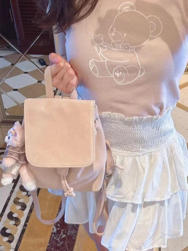 Dirbtinės zomšos kuprinės su atvartais Moteriškos senovinės klasikinės laisvalaikio didelės talpos prašmatnus korėjietiško stiliaus koledžo populiarūs mergaitiški studentų krepšiai