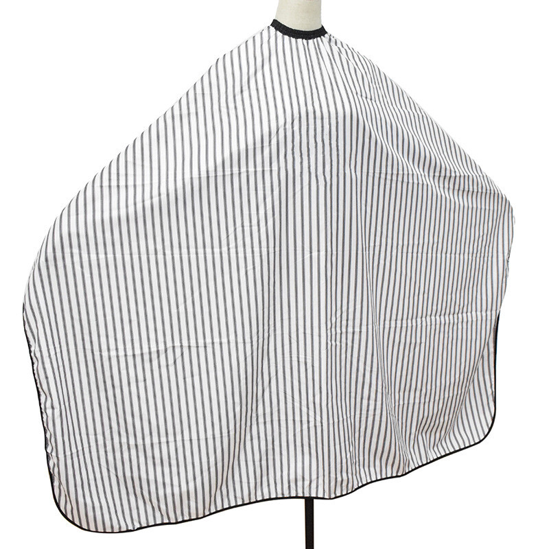 Ρυθμιζόμενη ασπρόμαυρη λωρίδα Υψηλής ποιότητας κούρεμα κομμωτηρίου κουρέας Πανί αδιάβροχο φόρεμα κούρεμα μαλλιών/Κάπα κουρέων