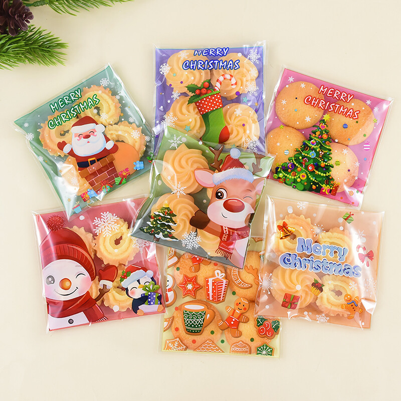 100 ks vianočných sušienok, cukríkových vrecúšok, Santa Claus, snehuliak, sušienky, občerstvenie, plastové baliace vrecká, novoročné, vianočné párty potreby.