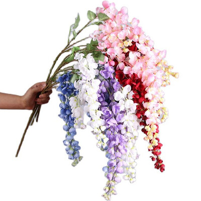 Naujas pristatymas One Silk Wisteria kabantis žalumynas, dirbtinis 6 gėlių stygos auksinis dušo medžio šakelė, skirta sienų gėlių dekoravimui