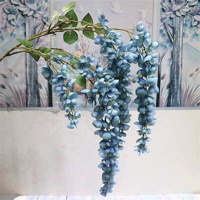 Naujas pristatymas One Silk Wisteria kabantis žalumynas, dirbtinis 6 gėlių stygos auksinis dušo medžio šakelė, skirta sienų gėlių dekoravimui