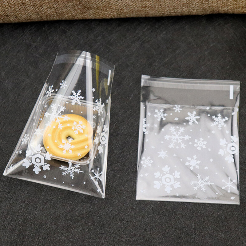 100 bucăți saci de bomboane de Crăciun cu fulgi de zăpadă, biscuiți transparenți, pentru gustări, pachete pungi autoadezive, pachet de copt pentru petrecerea de Crăciun