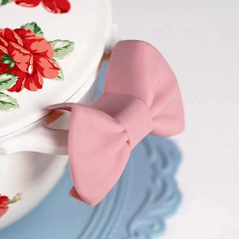 2db szilikon sütőkesztyű kreatív masni alakú sütőkesztyű hőálló edénytartók főzéshez Mini sütőkesztyű konyhai eszköz