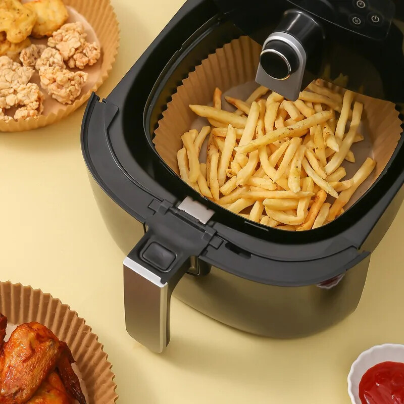 50 DB Air Fryer eldobható papír bélés tapadásmentes, olajálló pergamen szőnyeg főzéshez Mikrohullámú sütőben gőzölő kosár sütőeszközök