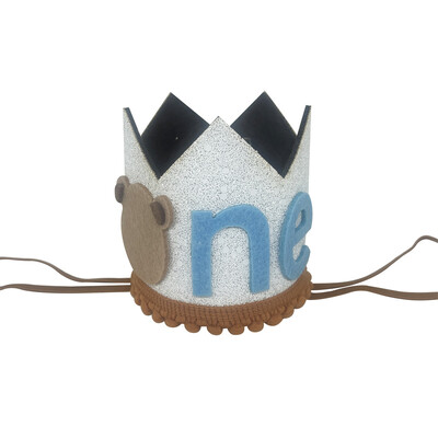 1 vnt. meškiukas 1 metų gimtadienio karūnos galvos apdangalas berniukui, mergaitei 1-ojo gimtadienio vakarėliui, kepuraitėms vaikams, pirmojo jubiliejaus vakarėliams