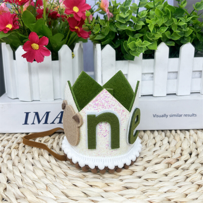 1 vnt. meškiukas 1 metų gimtadienio karūnos galvos apdangalas berniukui, mergaitei 1-ojo gimtadienio vakarėliui, kepuraitėms vaikams, pirmojo jubiliejaus vakarėliams