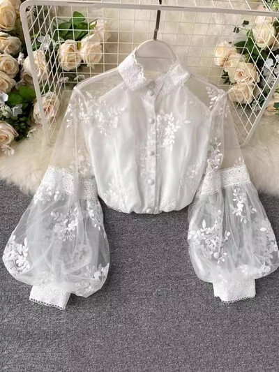 EWQ nyári fényvédő alkalmi ing női csipkével hímzett állvány gallér lámpás ujjak egysoros felsők 2024 új 27C442