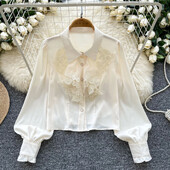 Pamatinformācija ar polo kakla izgriezumu, retro stila garām laternām piedurknēm, elegantām mežģīnēm, elegantām, vienrindām franču ielas apģērba augšdaļas rudens blūze