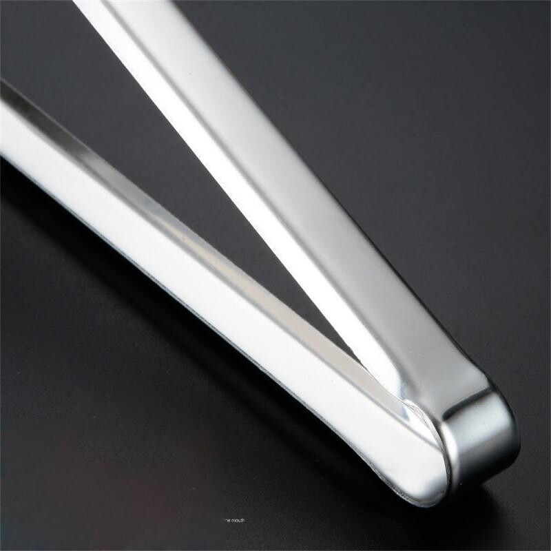 Maisto žnyplės nerūdijantis plienas, neslystantis, pagilintas, dantytas buitinis makaronų spaustukas, virtuvė, nesunku gauti nešiojamų kepsnių žnyplių šukos