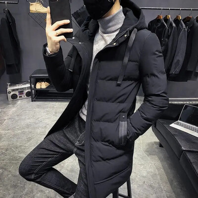 Ziemas vīrietis pagarina kokvilnas mētelis dūnu jaka vidēja garuma pāri ceļgaliem sabiezina jauniešu kapuci vaļīga, saglabā siltumu. Temperaments Vienkāršs