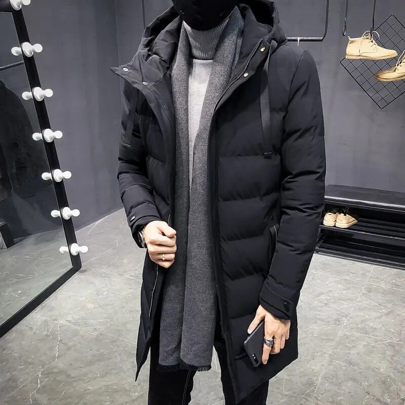 Ziemas vīrietis pagarina kokvilnas mētelis dūnu jaka vidēja garuma pāri ceļgaliem sabiezina jauniešu kapuci vaļīga, saglabā siltumu. Temperaments Vienkāršs