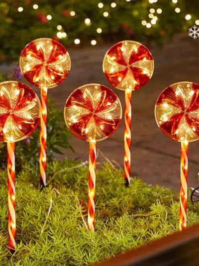 Ziemassvētku konfektes zemējuma spraudņa gaisma LED saules āra ūdensnecaurlaidīga pagalma zāliena dekorēšanas atmosfēra gaismas konfekšu gaisma