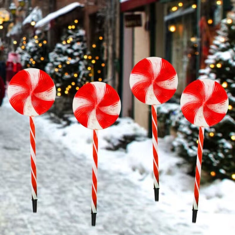 Ziemassvētku konfektes zemējuma spraudņa gaisma LED saules āra ūdensnecaurlaidīga pagalma zāliena dekorēšanas atmosfēra gaismas konfekšu gaisma