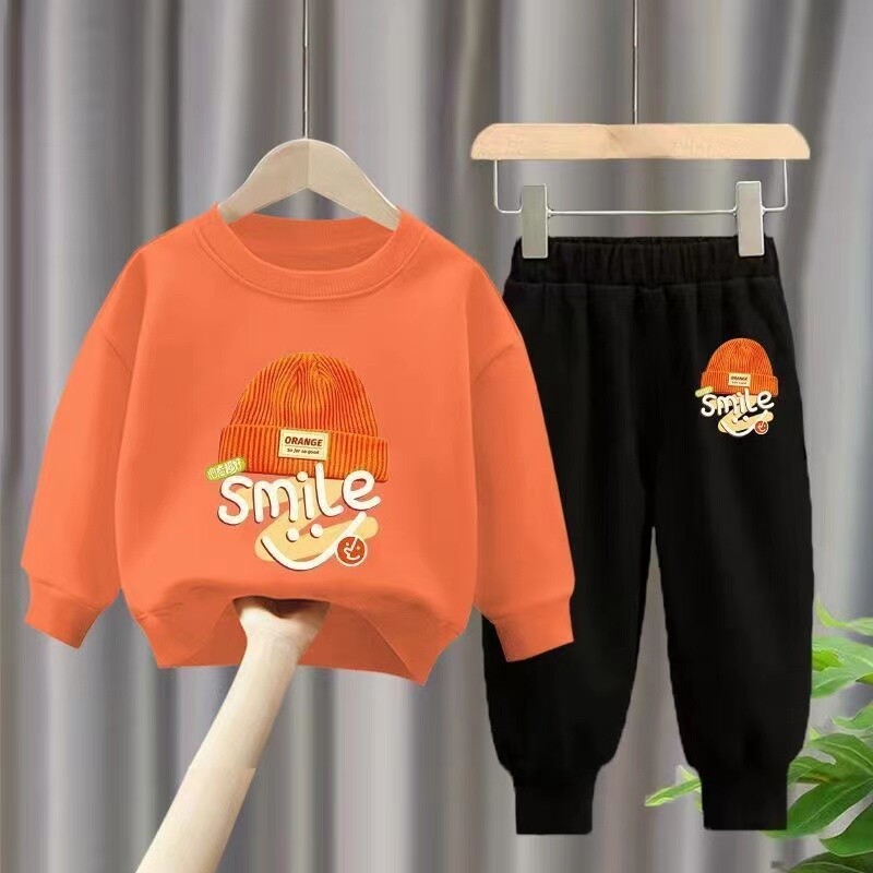 Rudens kūdikių mergaičių berniuko rūbų rinkinys Vaikiškas sportinis animacinis filmukas Šypsenos megztinis viršus ir kelnės užpakaliukas dviejų dalių kostiumas medvilninis sportinis kostiumas