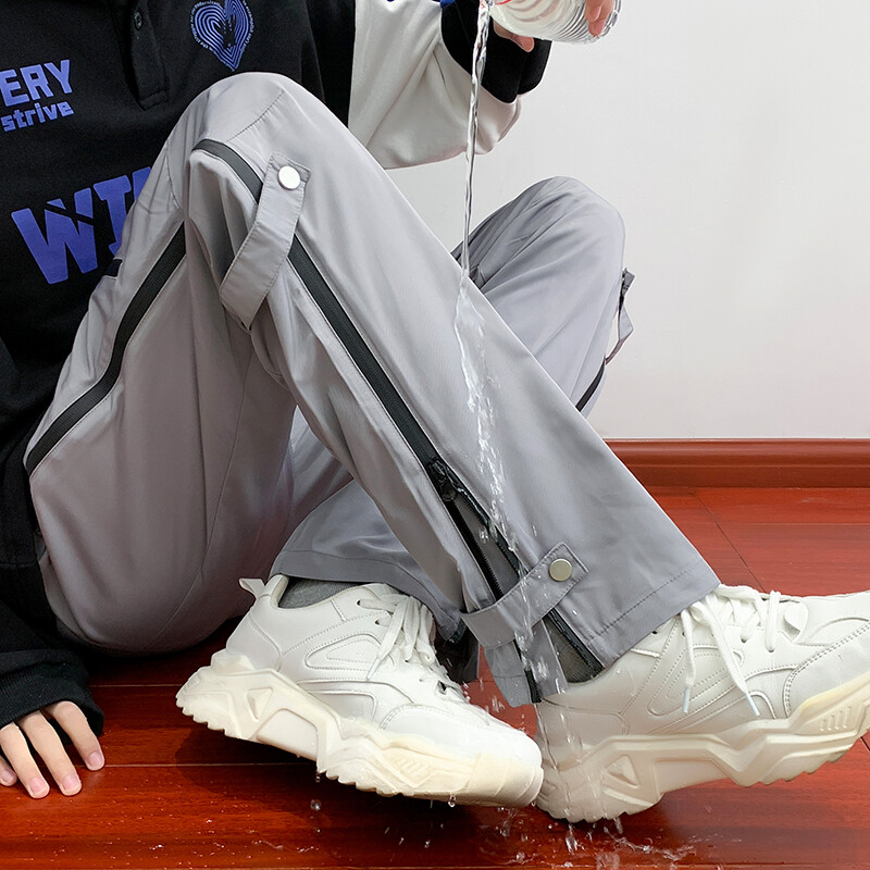 Amerikietiškos funkcionalaus stiliaus įžeidžiančios vyriškos kelnės rudenį naujos darbo dėvimos sportinės neperšlampamos juodos vasarinės laisvalaikio kelnės vyrams