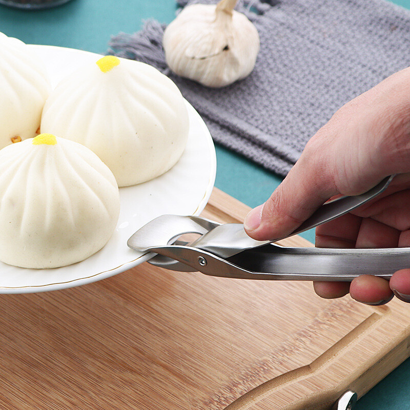 Nerūdijančio plieno sulankstomas karšto indo spaustukas, apsaugantis nuo nuplikimo puodo lėkštės spaustukai, žnyplės, garinami indai, griebtuvų laikikliai, virtuvės reikmenys