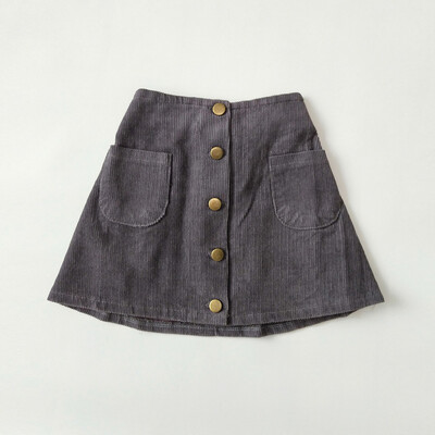 Divat lányoknak, magas derekú, A vonalú félhosszú szoknya baba kordbársony arany egysoros gombos rövid szoknya 2024 Új, egyszerű, hétköznapi szoknya