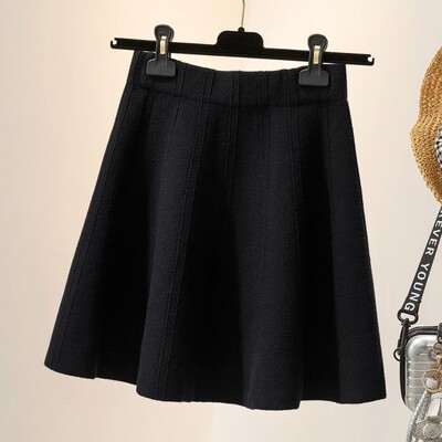 Modes sieviešu vienkrāsains mini trikotāžas svārki rudens ziemas sieviešu apģērbi korejiešu vienkāršība elastīgi svārki ar augstu vidukli A-līnijas