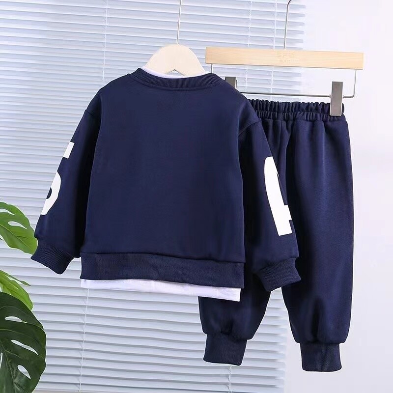 Jauns rudens zīdaiņu meiteņu apģērbs bērnu zēnu ikdienas burtu krekls ar garām piedurknēm bikses 2 gab./komplekti Mazu bērnu apģērbi, bērnu treniņtērpi