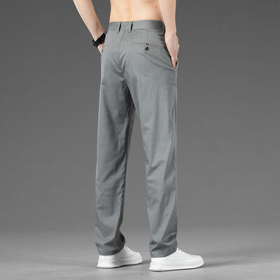 Nyári vékony sztreccs alkalmi nadrág férfiaknak egyszínű koreai stílusú, bő egyenes, kényelmes üzleti alkalmi hosszú nadrág férfi