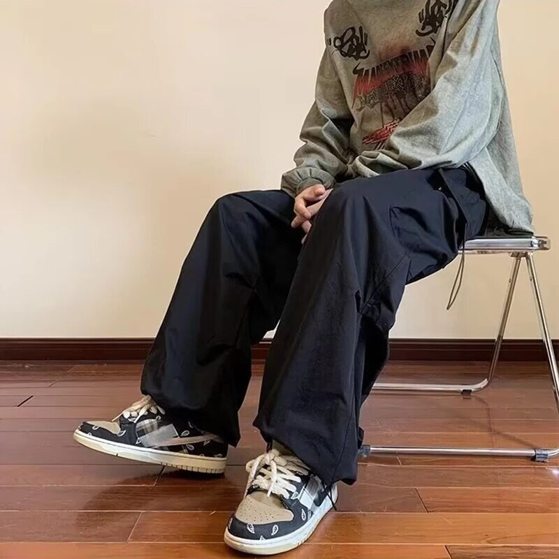 2024 m. Nauji vyriški kombinezonai su daug kišenių amerikietiškos hiphop kelnės Vyriškos „High Street“ pavasario ir rudens kelnės.