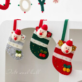 Διασυνοριακά χριστουγεννιάτικα διακοσμητικά τρισδιάστατα μάλλινα τσόχα κούκλα παππού Άγιος Βασίλης Παιδικές κάλτσες Κάλτσες καραμέλα Τσάντα δώρου