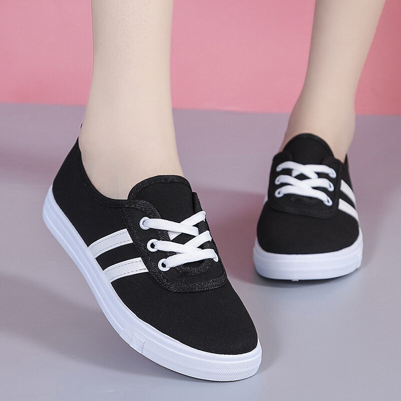 Klasszikus női kerek orrú fehér vászoncipő diákoknak és iskolás nőknek Menő fekete kényelmes utcai fűzős cipő 2024