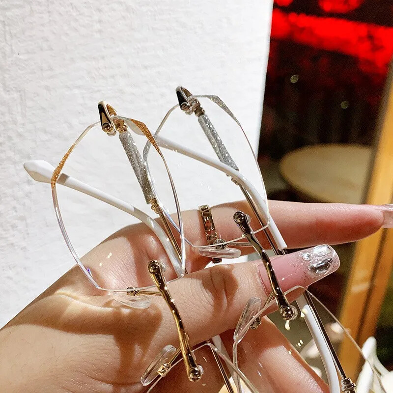Gyémánt csiszolású olvasószemüvegek Luxus keret nélküli antikék fény Presbyopia szemüvegek kész optikai távollátó szemüveg Dioptria