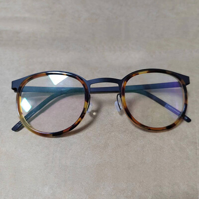 Design de marcă Danemarca Rame de ochelari Bărbați Femei Ochelari de vedere vintage rotunzi din titan Ochelari fără șuruburi Ochelari pentru miopie Optical 9704