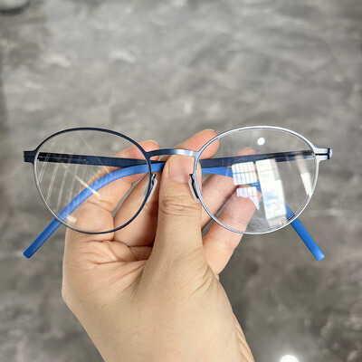 2024 New Germany Férfi négyszögletes csavar nélküli szemüvegkeret divat ultrakönnyű 7,5 g márka dizájn szemüveg üzleti szemüveg szemüveg