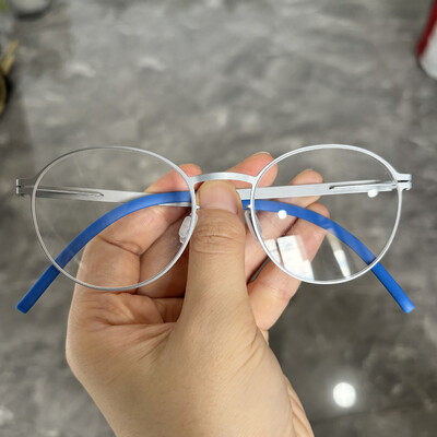 2024 New Germany Férfi négyszögletes csavar nélküli szemüvegkeret divat ultrakönnyű 7,5 g márka dizájn szemüveg üzleti szemüveg szemüveg