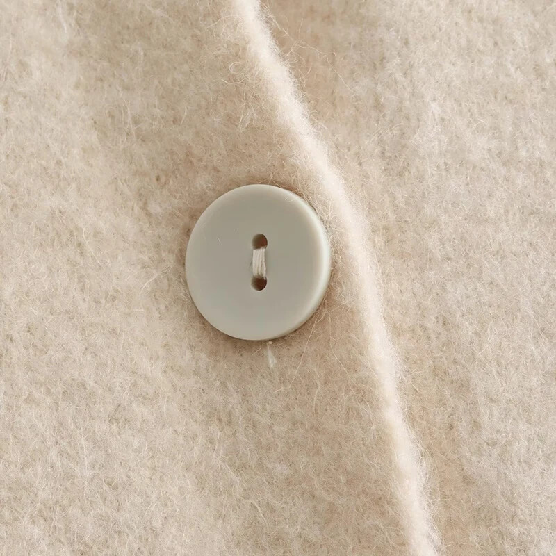 Laxsesu baltas megztinis moteriškas megztinis šiltas o formos laisvalaikio paltas Pavasario ruduo 2024 m. Naujas tamprus moteriškas mados megztas megztinis