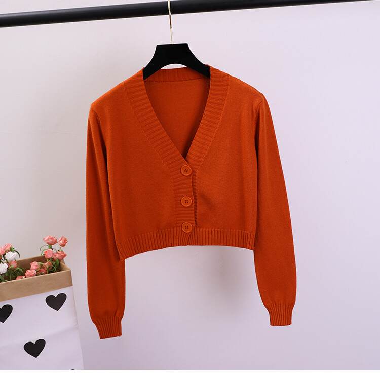 Moteriški sutrumpinti megztiniai Moteriški juodi balti trumpi megztiniai V kaklo džemperis su viena krūtine Moteriškas megztas megztinis GD153