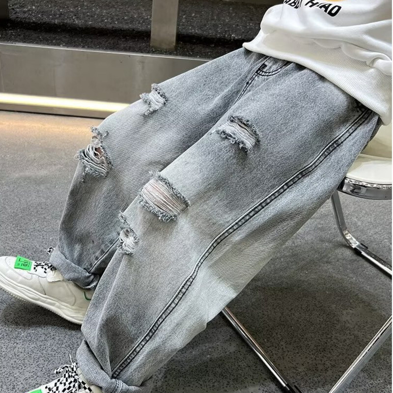 Gyermek őszi nadrágok, rongyos fiúk farmernadrágok, tavaszi és őszi hosszúnadrágok, őszi új nyugati stílusú robbanékony utcai trend