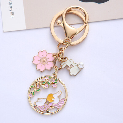 Módna sladká smaltovaná kľúčenka s králikom v tvare čerešňového kvetu pre ženy a dievčatá, roztomilá kľúčenka s kvetom mesiaca, taška, kľúč od auta, prívesok, šperky, darček
