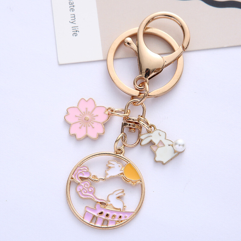 Módna sladká smaltovaná kľúčenka s králikom v tvare čerešňového kvetu pre ženy a dievčatá, roztomilá kľúčenka s kvetom mesiaca, taška, kľúč od auta, prívesok, šperky, darček