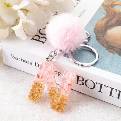 1vnt Pink Pompom Letter Raktų pakabukas Anglų abėcėlės raktų pakabukas su Puffer Ball Glitter Gradient Resin Automobilinio veidrodžio rankinės pakabukai