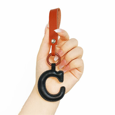 Aranyos PU bőr betűkkel kulcstartó AZ színes kezdőbetűkkel függő karkötővel Női Lányoknak Kézitáskák Pénztárca Bűvészek Kiegészítők