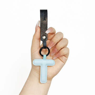 Aranyos PU bőr betűkkel kulcstartó AZ színes kezdőbetűkkel függő karkötővel Női Lányoknak Kézitáskák Pénztárca Bűvészek Kiegészítők