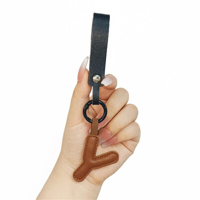 Aranyos PU bőr betűkkel kulcstartó AZ színes kezdőbetűkkel függő karkötővel Női Lányoknak Kézitáskák Pénztárca Bűvészek Kiegészítők