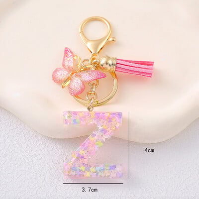 Breloc cu alfabet drăguț cu ciucuri la modă, rășină, paiete colorate, breloc cu scrisoare fluture, ideal pentru poșeta festivă pentru doamne.