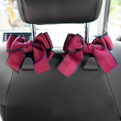 Universālie sēdekļa atzveltņu organizētāji 2 iepakojumā, jauki Bowknot automašīnas galvas balstu somu pakaramie Spēcīgi, izturīgi automātiskās aizmugurējās sēdekļa glabāšanas āķi