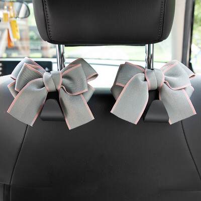 Universālie sēdekļa atzveltņu organizētāji 2 iepakojumā, jauki Bowknot automašīnas galvas balstu somu pakaramie Spēcīgi, izturīgi automātiskās aizmugurējās sēdekļa glabāšanas āķi