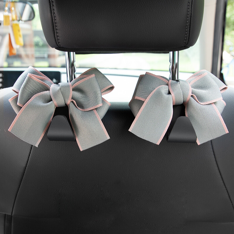 Universālie sēdekļa atzveltņu organizētāji 2 iepakojumā, jauki Bowknot automašīnas galvas balstu somu pakaramie Spēcīgi, izturīgi automātiskās aizmugurējās sēdekļa glabāšanas āķi