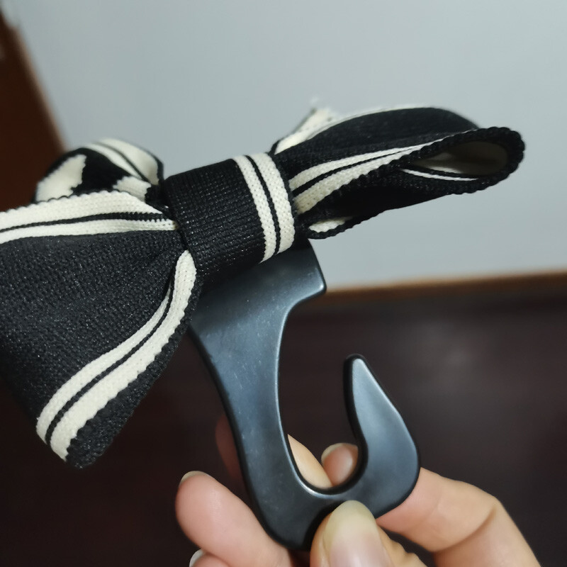 Univerzális Lover Bowknot Autóhorgok Ülés háttámla Jármű Fejtámla Szervező Tároló Akasztó Élelmiszer Kézitáska Női Autós Kiegészítők