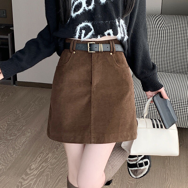 Rudens ir žiemos rudas sijonas Moteriškas smulkus abrikosinis aksominis sijonas Universalus liekninantis aukšto juosmens A formos klubų sijonas