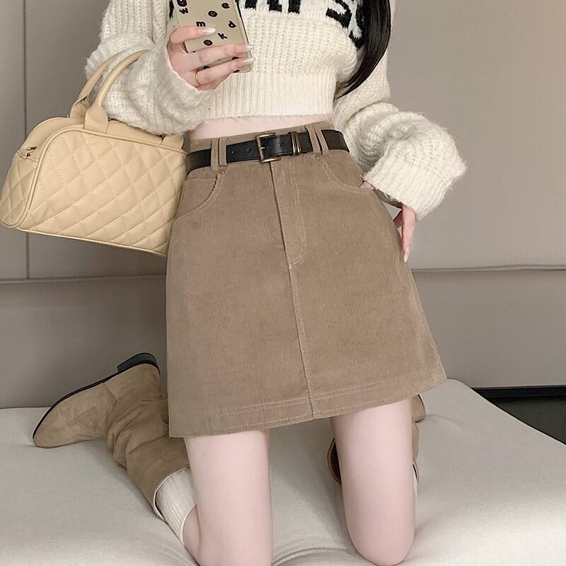 Rudens ir žiemos rudas sijonas Moteriškas smulkus abrikosinis aksominis sijonas Universalus liekninantis aukšto juosmens A formos klubų sijonas